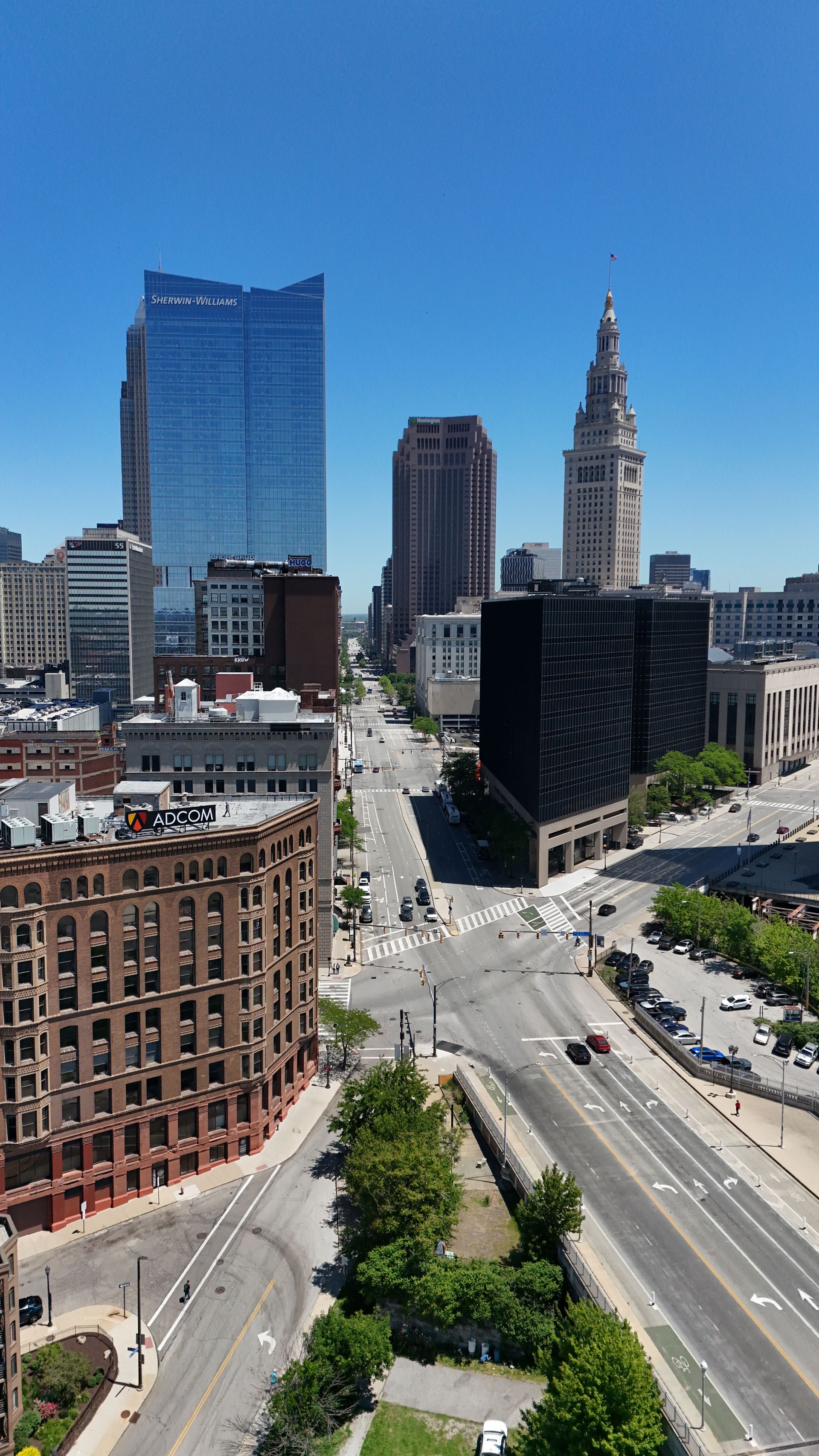 Vertical aerial photograph of downtown Cleveland featuring the Sherwin-Williams headquarters and Terminal Tower — Stratum Aerial Media
