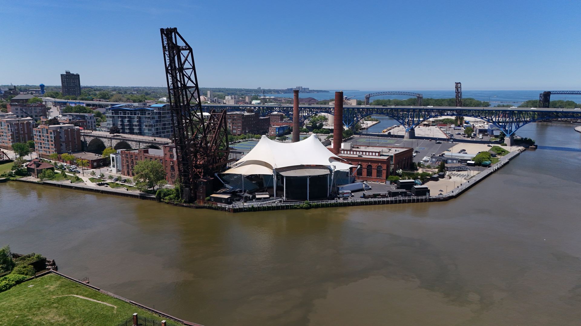 Aerial photograph of Cleveland's Warehouse District with historic loft buildings and Lake Erie on the horizon — Stratum Aerial Media